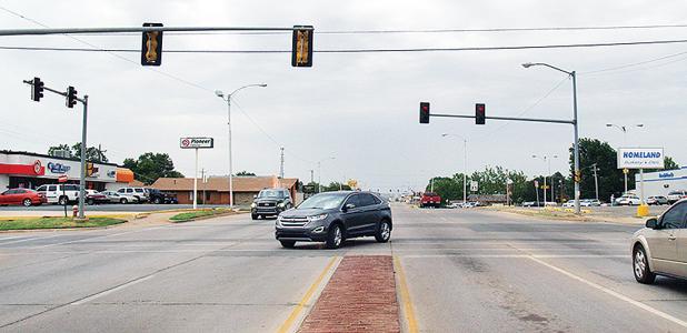 The four-way stop sign has been removed but the flashing red lights remain in all directions at 13th and Gary. Article Image Alt Text