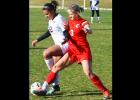 Riley Bryson fights for the ball versus Elgin Riley Bryson