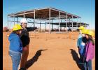 Surveying progress at the construction site of the new Corn Bible Academy are, from left, Western Oklahoma Christian School Principal Dora Miller, building project manager Roy Ray, and WOCS sixth-graders Delicity Walters, Phillip Javorsky and Rachel Gwartney. 