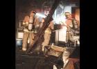Clinton firemen work to extinguish a blaze Tuesday night at 223 Rawlings. From the left are Volunteer D.J. Woodall, Fire Chief Forrest Valentine, and Firefighter Caleb Moore.