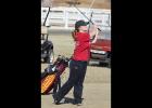  Ashlin Murray swings through a shot during practice.