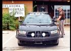 Lt. Donnie Kerr checks his car at Troop H headquarters before starting his shift.