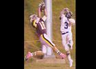  Senior wide receiver Tony Ramos (No. 16) catches his first touchdown of the season from sophomore quarterback Gage Gaunt.