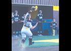 Junior catcher Nikki Ray makes the catch on a Woodward foul ball. The Lady Reds piled on the fielding errors resulting in a 15-1 loss.