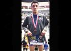 Hayden Williams holds up his All-American award and shows off his second place medal at the 2018 Adidas Nationals. Article Image Alt Text
